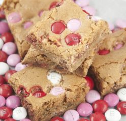 Brown Sugar M&M Blondies are an easy dessert to make for Valentine's day or any occasion. They are, soft, chewy and full of flavor!