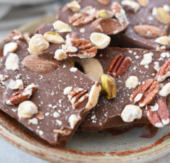 Close up, plated 5-ingredient Salted Chocolate Almond Hazelnut Bark recipe is a beautiful, festive special occasion or holiday dessert that makes for a great edible birthday or Christmas gift for family, co-workers, and friends!
