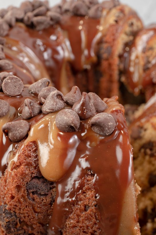 Ganache covering the Peanut Butter Chocolate Chip Bundt Cake recipe for the holidays